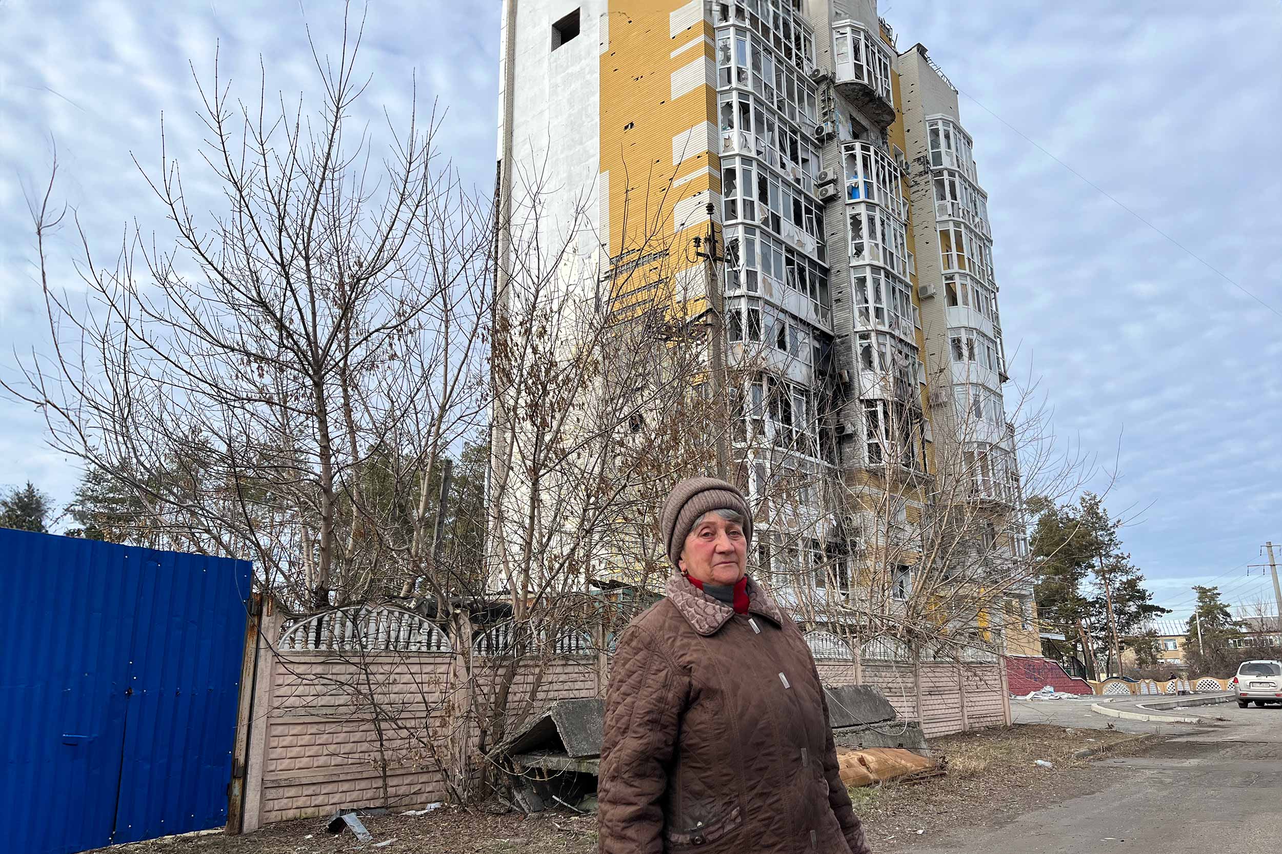 “I just want it to stop” – Valentina, an senior outside a heavily damaged residential building in Lyman, eastern Ukraine, says she wants the war to end: “We have already gone through a lot. We don’t want to experience it any longer.” © Anthony Borden