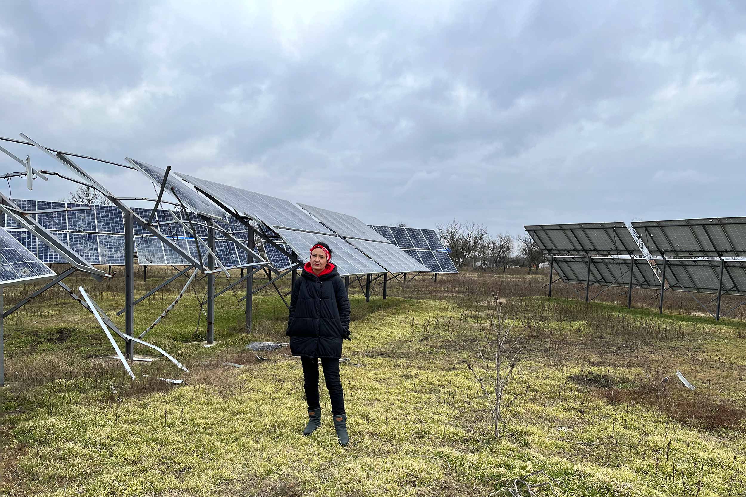 Yalovenko family's investment in solar panels located in a small field behind their house was devastated by Russian shelling and is now useless and irreparable. © IWPR
