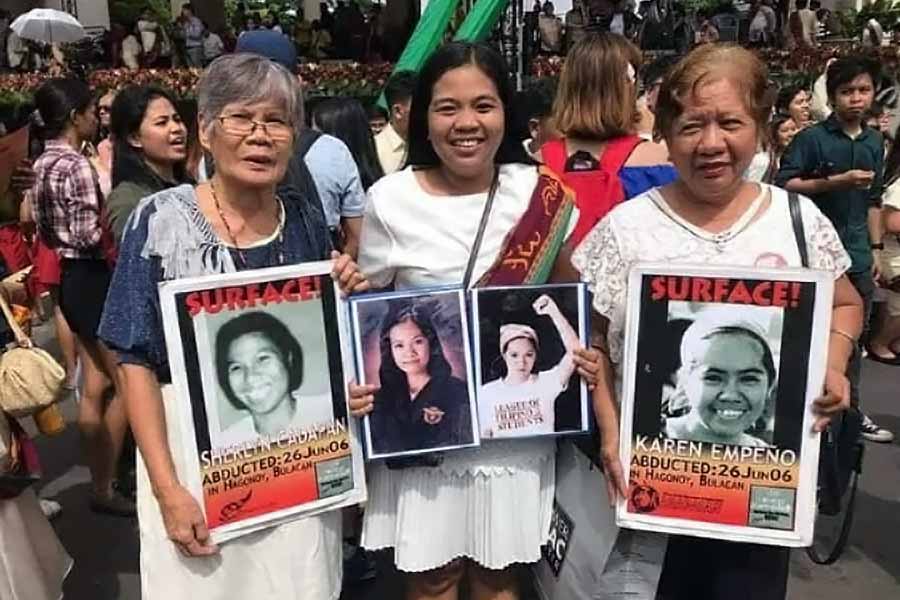Concepcion Empeño (right) and Erlinda Cadapan (left), the mothers of two missing students, join a graduate of their daughters’ school in their call to find their loved ones. Photo courtesy of Concepcion Empeño