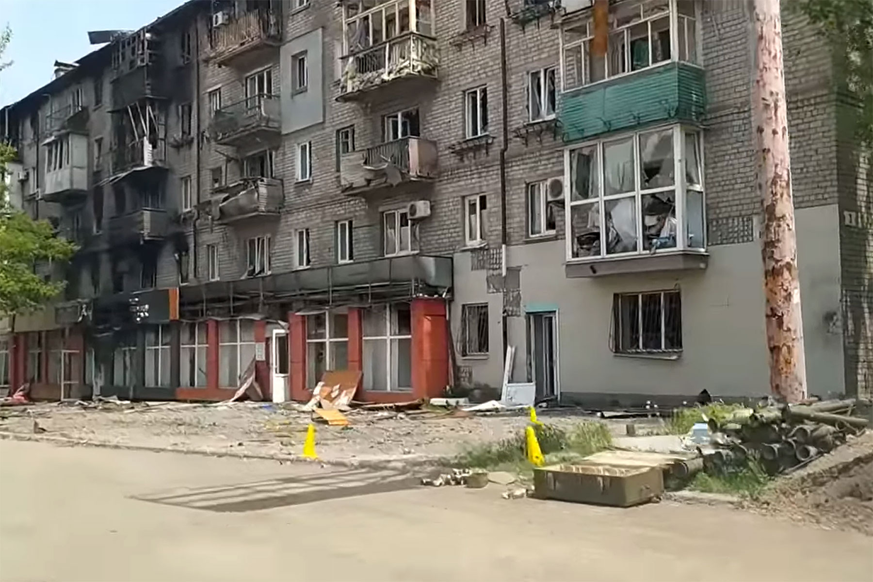 In March 2022, the Mykhailenko spent three weeks hiding in the basement of this apartment block in Mariupol. Photo courtesy of Kateryna Mykhailenko.